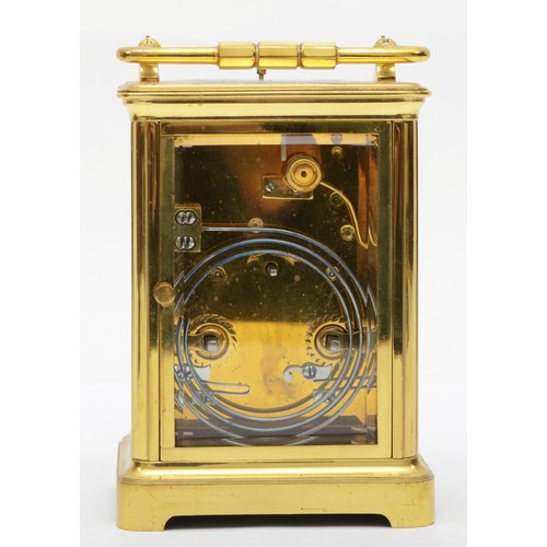 382 - A 20th century French brass and glass corniche cased repeat striking carriage clock, the white dial ... 