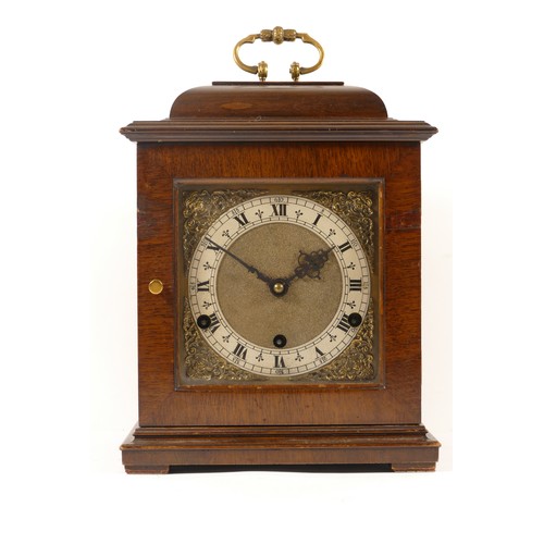 388 - A 20th century mahogany cased mantle clock, the glass door opening to reveal brass dial, the brushed... 