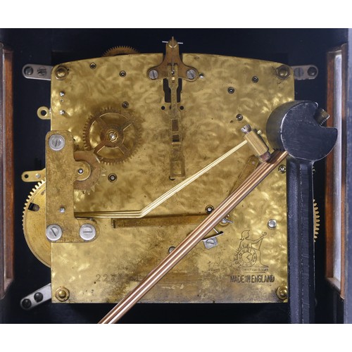 388 - A 20th century mahogany cased mantle clock, the glass door opening to reveal brass dial, the brushed... 