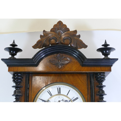 389 - A 19th century walnut cased Vienna style regulator wall clock, the white dial with black Roman numer... 