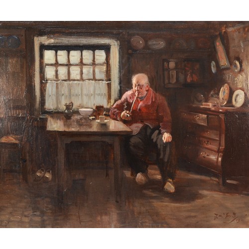 411 - J R Creig, Dutch school, early 20th century, man sitting at the kitchen table, oil on canvas, signed... 