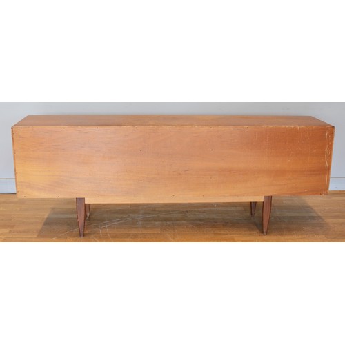 430 - Victor Wilkins for G-Plan, a mid 20th century teak sideboard with four central drawers flanked by tw... 