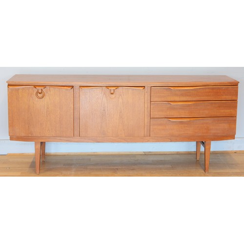 431 - Beautility, a mid 20th century teak sideboard/drinks cabinet with single cupboard door, fall front d... 