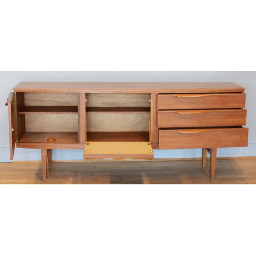 431 - Beautility, a mid 20th century teak sideboard/drinks cabinet with single cupboard door, fall front d... 