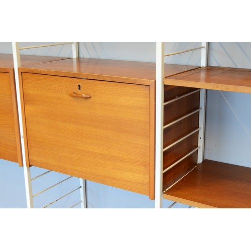 432 - Staples Ladderax, a mid 20th century c1973 three white painted metal and teak three bay modular room... 