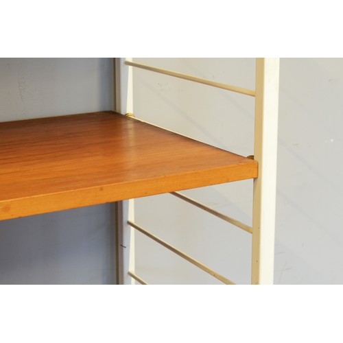 432 - Staples Ladderax, a mid 20th century c1973 three white painted metal and teak three bay modular room... 