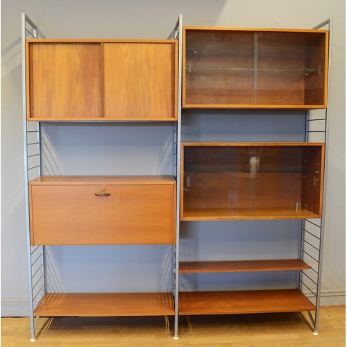 434 - Staples Ladderax, a mid 20th century teak and grey painted modular room unit, two cabinets each with... 