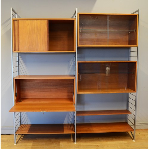 434 - Staples Ladderax, a mid 20th century teak and grey painted modular room unit, two cabinets each with... 