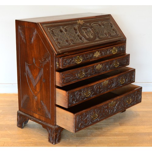 436 - A late 19th century carved mahogany fall front bureau, opening to reveal fitted interior with four g... 