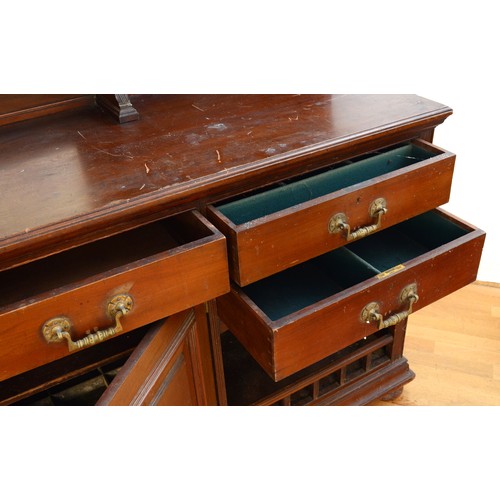 438 - A late 19th century mahogany bevel edged mirror backed sideboard, possibly by Heals, with blind dent... 