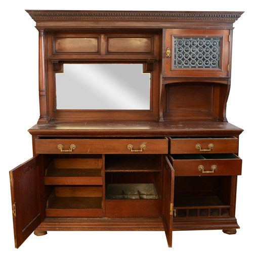 438 - A late 19th century mahogany bevel edged mirror backed sideboard, possibly by Heals, with blind dent... 