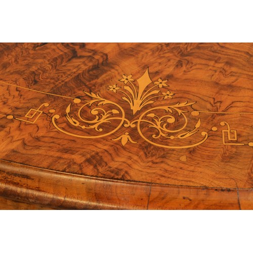 439 - A late Victorian inlaid walnut oval loo table stamped Bros, raised on quadruple carved Greek Key and... 