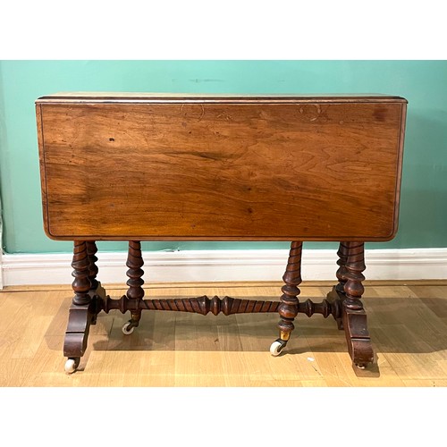 452 - A 19th century walnut Sutherland drop leaf gateleg table, raised on turned supports and turned stret... 