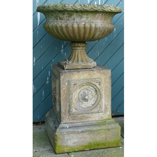 459 - A pair 20th century concrete garden urns, raised on carved rectangular plinth, 100cm high