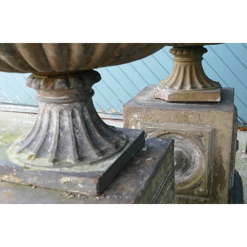 459 - A pair 20th century concrete garden urns, raised on carved rectangular plinth, 100cm high