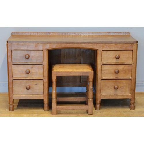 461 - Wilf ‘Squirrelman’ Hutchinson of Husthwaite, a 20th century carved adzed carved oak matching desk an... 