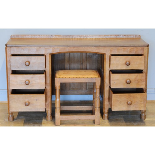 461 - Wilf ‘Squirrelman’ Hutchinson of Husthwaite, a 20th century carved adzed carved oak matching desk an... 