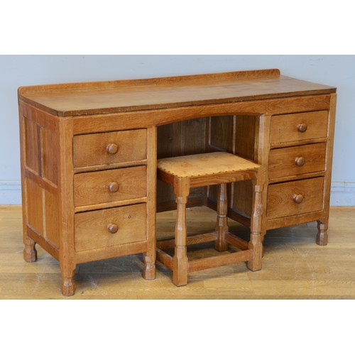 461 - Wilf ‘Squirrelman’ Hutchinson of Husthwaite, a 20th century carved adzed carved oak matching desk an... 