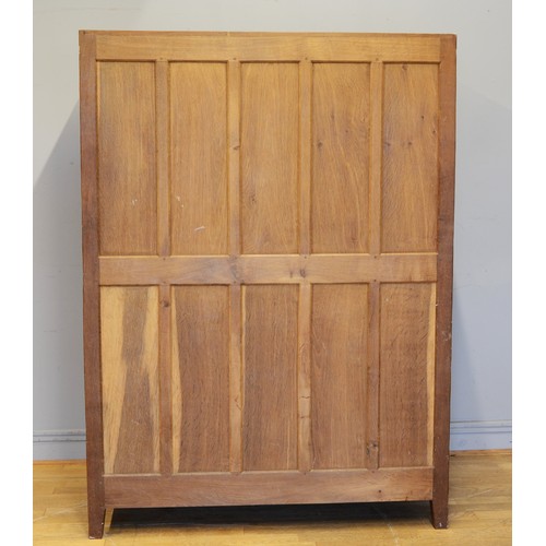 464 - Peter 'Rabbitman' Heap of Wetwang, a 20th century carved oak panelled twin door wardrobe/hall cupboa... 