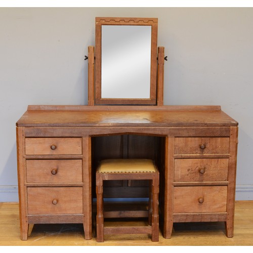 466 - Peter 'Rabbitman' Heap of Wetwang, a mid 20th century adzed oak mirror back twin pedestal dressing t... 