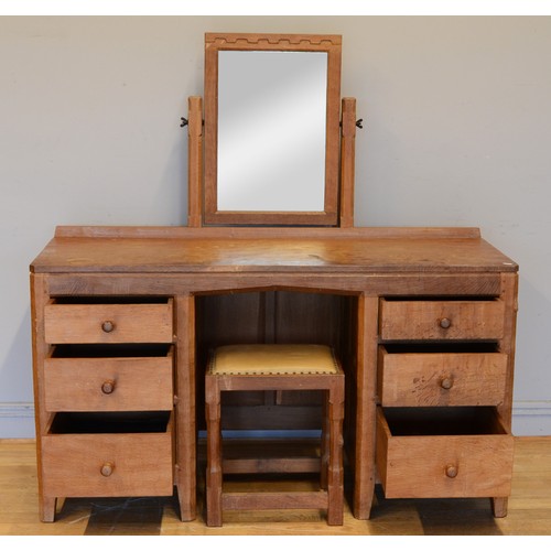 466 - Peter 'Rabbitman' Heap of Wetwang, a mid 20th century adzed oak mirror back twin pedestal dressing t... 