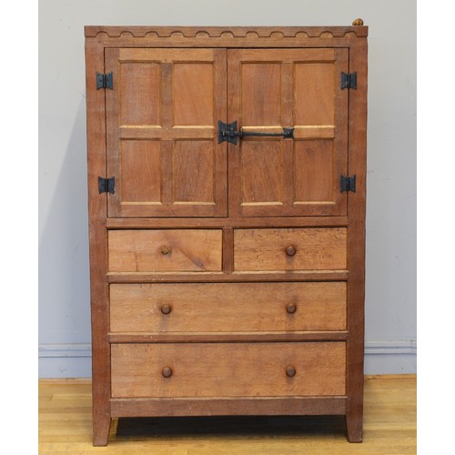 467 - Peter 'Rabbitman' Heap of Wetwang, a mid 20th twin door tallboy with two short over two long drawers... 