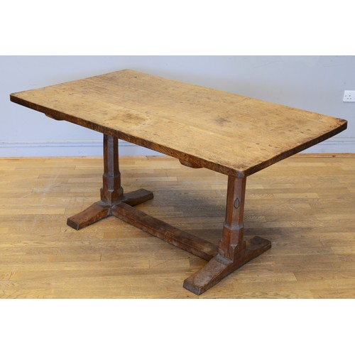 469 - Peter 'Rabitman' Heap of Wetwang, a 20th century carved oak refectory dining table raised on octagon... 