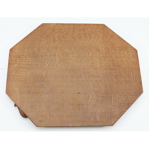 472 - Robert 'Mouseman' Thompson of Kilburn, a 20th century oak octagonal chopping board with carved mouse... 