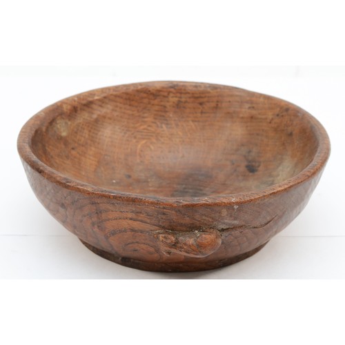 474 - Robert 'Mouseman' Thompson of Kilburn, an early/mid 20th century adzed oak circular bowl with carved... 