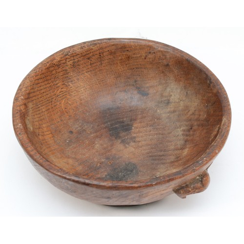 474 - Robert 'Mouseman' Thompson of Kilburn, an early/mid 20th century adzed oak circular bowl with carved... 