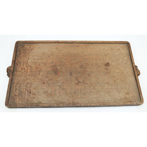 477 - Robert 'Mouseman' Thompson of Kilburn, an early/mid 20th century slightly adzed oak rectangular tray... 