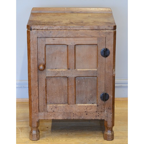 487 - Robert 'Mouseman' Thompson of Kilburn, a 20th century adzed oak single panelled door single door bed...