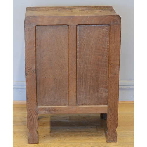 487 - Robert 'Mouseman' Thompson of Kilburn, a 20th century adzed oak single panelled door single door bed... 