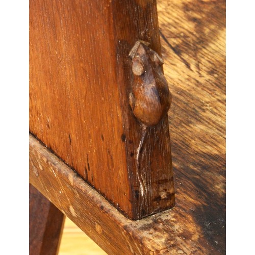 488 - Robert 'Mouseman' Thompson, a 20th century carved oak three legged spinning chair, with carved pierc... 