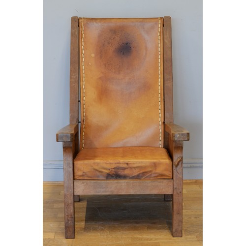 490 - Robert 'Mouseman' Thompson, a mid 20th century carved oak smoking chair with brown leather back and ... 