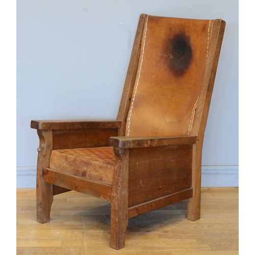 491 - Robert 'Mouseman' Thompson of Kilburn, a mid 20th century carved oak smoking chair with brown leathe... 