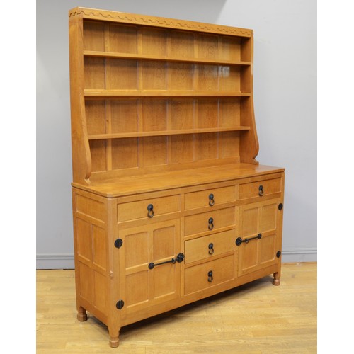 492 - Robert 'Mouseman' Thompson of Kilburn , a adzed oak Welsh dresser, c1980s, with three shelf plate ra... 