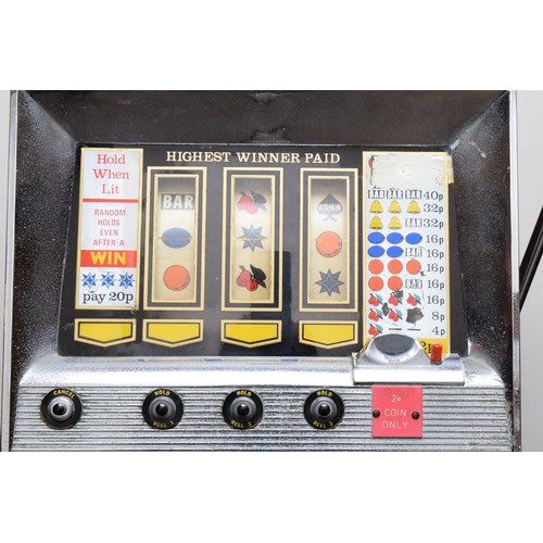 500 - Bally, an electromechanical three reel and hold slot machine, c.1965/70, 48 x 46 x 67cm, 2p play.
Pr... 