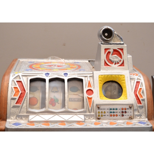 504 - O.D. Jennings, a Peacock doble jackpot mechanical slot machine, c.1932, aluminium case, 62 x 38 x 37... 