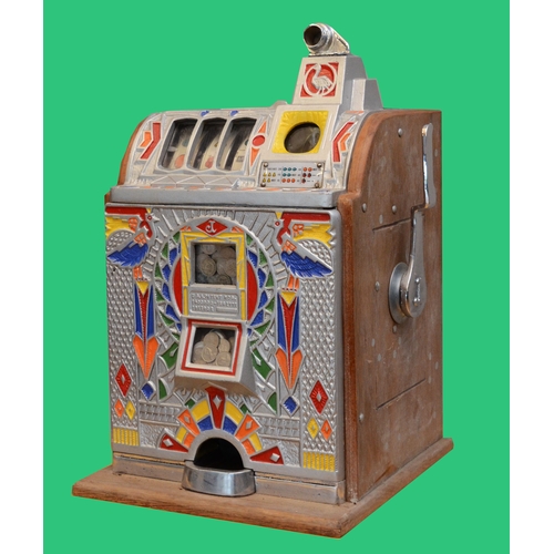 504 - O.D. Jennings, a Peacock doble jackpot mechanical slot machine, c.1932, aluminium case, 62 x 38 x 37... 