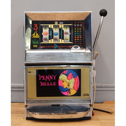 507 - Penny Belle by Bally, an electro-mechanical three reel slot machine, c.1960's, 65 x 40 x 40cm.
Key, ... 