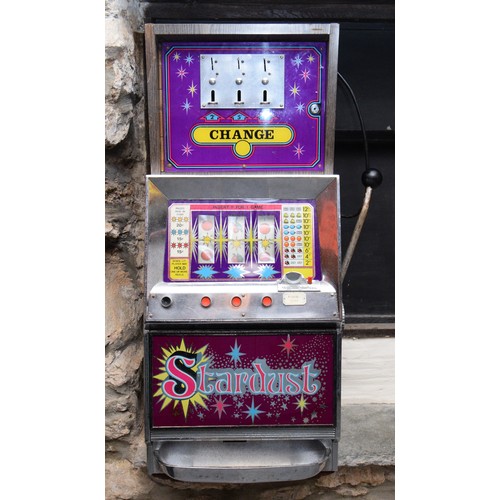 510 - Stardust, a three reel and hold slot machine with 2, 5, and 10p change above, 41 xc 46 x 99cm, plays... 