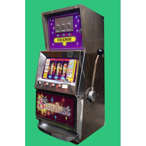 510 - Stardust, a three reel and hold slot machine with 2, 5, and 10p change above, 41 xc 46 x 99cm, plays... 