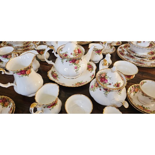 287 - Extensive Royal Albert Old Country Rose bone china part dinner and tea set comprising of a 27cm coff... 