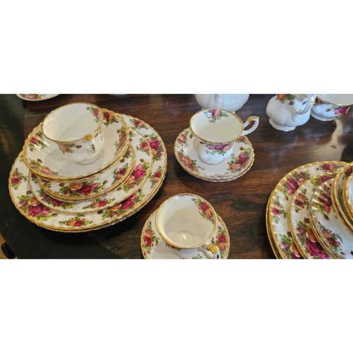 287 - Extensive Royal Albert Old Country Rose bone china part dinner and tea set comprising of a 27cm coff... 