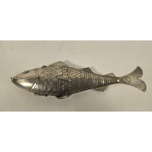 57 - An unmarked silver articulated fish, with hinged head and flexible body, 19cm, 114gm, and two other ... 