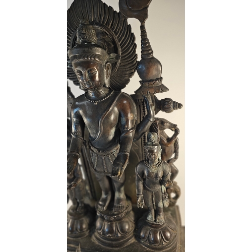 298 - A large Thai bronze statue group of Deities, the back section removeable, 100cm