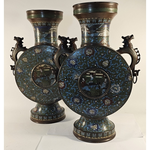 289 - A pair of early 20th century Chinese bronze and enamel moon vases, with elephant handles, 54cm