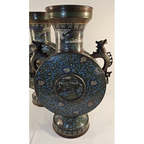 289 - A pair of early 20th century Chinese bronze and enamel moon vases, with elephant handles, 54cm