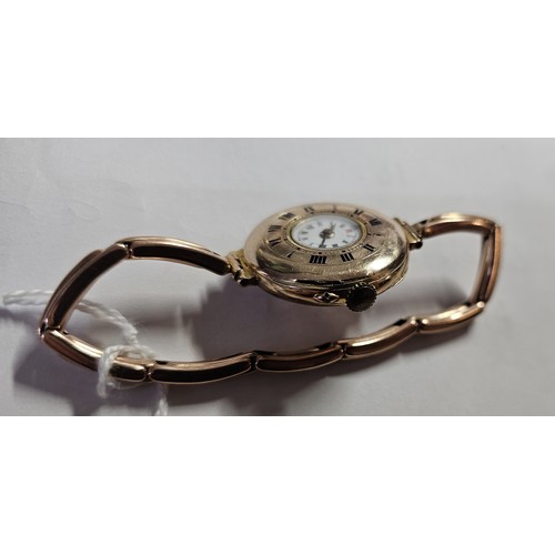 205 - A WWI 9ct rose gold ladies half hunter wristwatch, London import 1916, with expanding 9ct bracelet, ... 